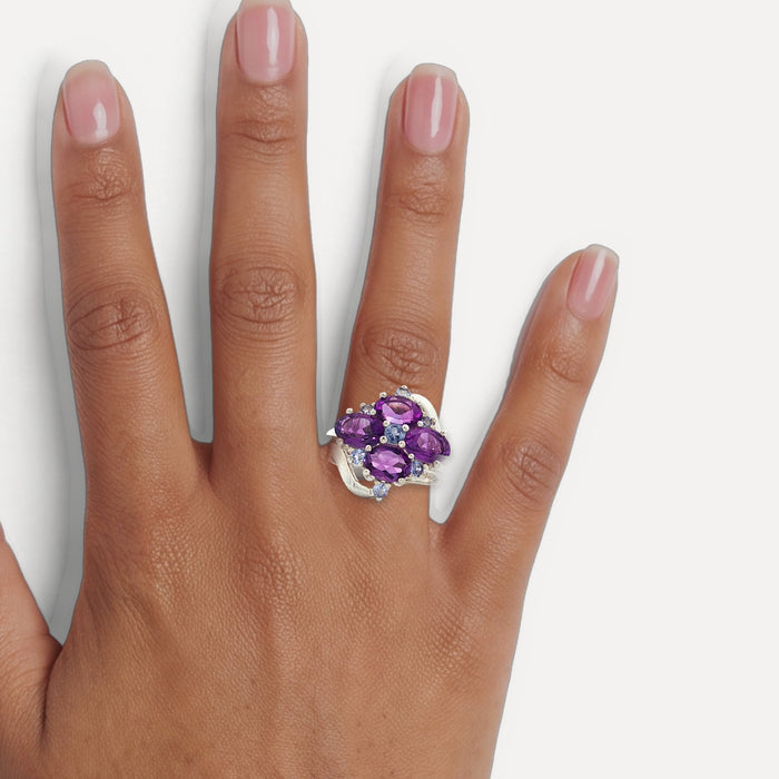 Purple & Sky Blue Split Shank CZ Ring in Sterling Silver shown on a hand (medium deep skin tone)