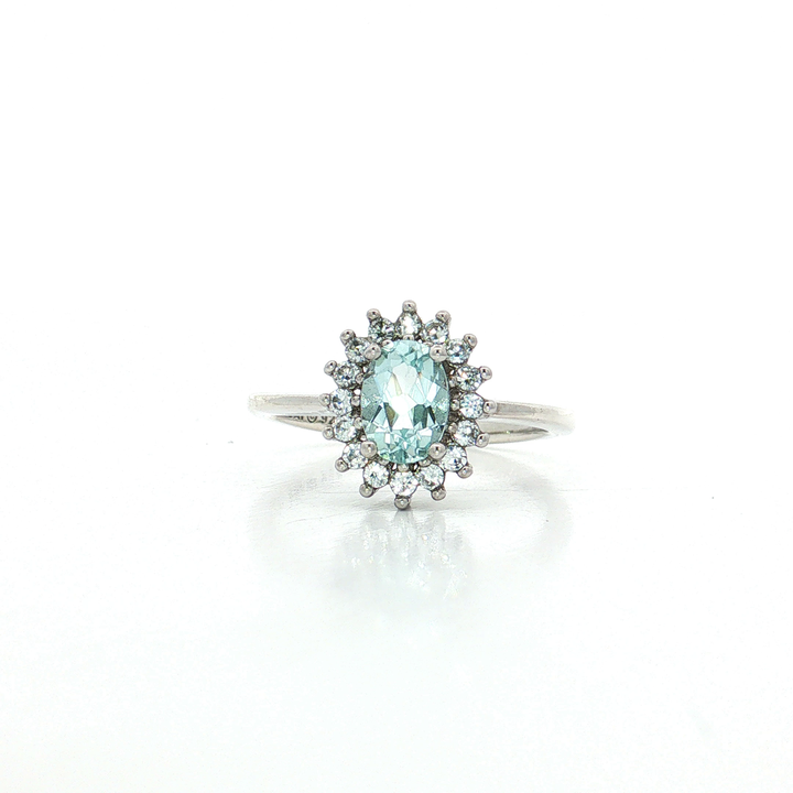 Oval-Shaped Vivid Aquamarine & CZ Halo Ring (⅔ ct. tw.) in Sterling Silver