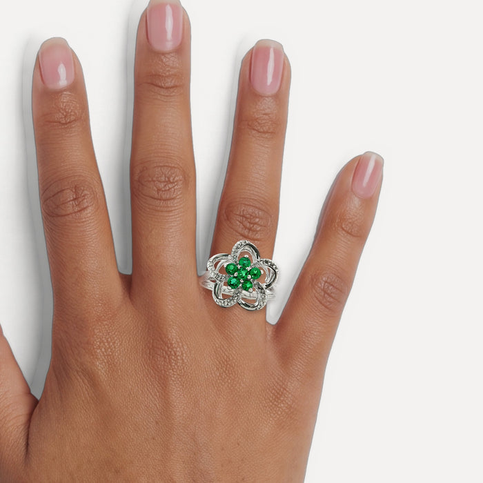 Flower Fashion Green & White CZ Ring in Sterling Silver shown on a hand (medium deep skin tone)