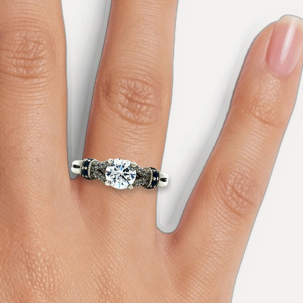 Round Brilliant & Sapphire Blue CZ Ring in Sterling Silver shown on a hand (medium skin tone)