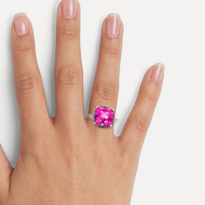 Pink Beryl Color Cushion Cut CZ Halo Ring in Sterling Silver shown on a hand (medium skin tone)