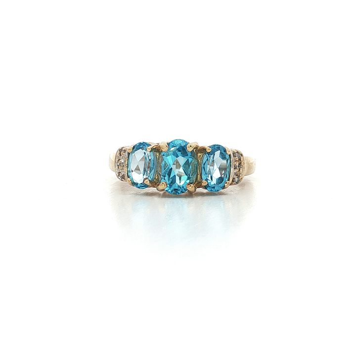 1.60 CTW AAAA Grade Oval Shape Swiss Blue Topaz Past Present Future Ring with Natural Near-Colorless Round Brilliant Cut Diamonds in 10kt Yellow Gold