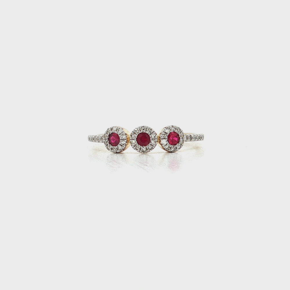 Video of Vivid Ruby Colorless Near-Flawless Three-Stone Halo Diamond Ring (⅓ ct. tw.) in 14k Yellow Gold