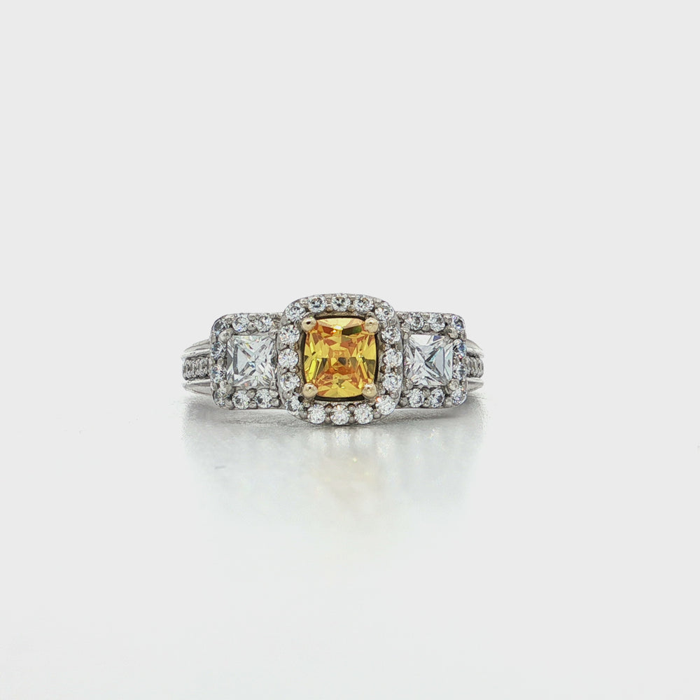 Video of Three-Stone "Past • Present • Future" Cushion Cut Citrine Color CZ Halo Ring in Sterling Silver