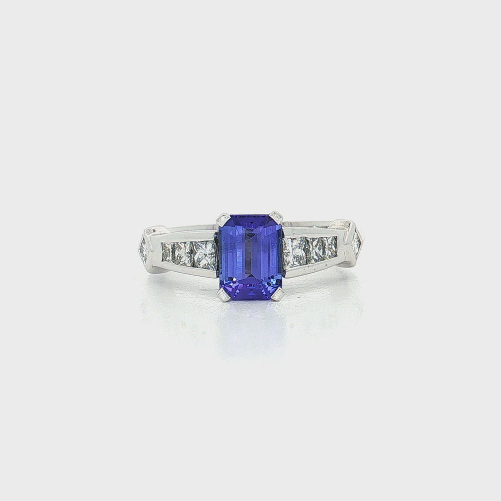 Vivid Emerald-Cut Tanzanite Channel-Set Diamond Ring in 18k White Gold