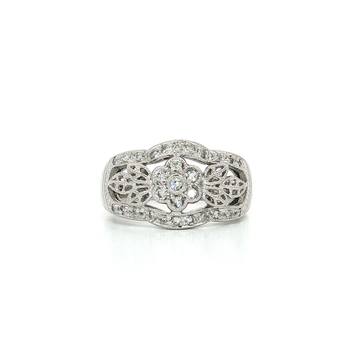 0.25 CTW of Natural Near-Colorless Round Brilliant Cut Diamonds in an Open Filigree Design Platinum Ring