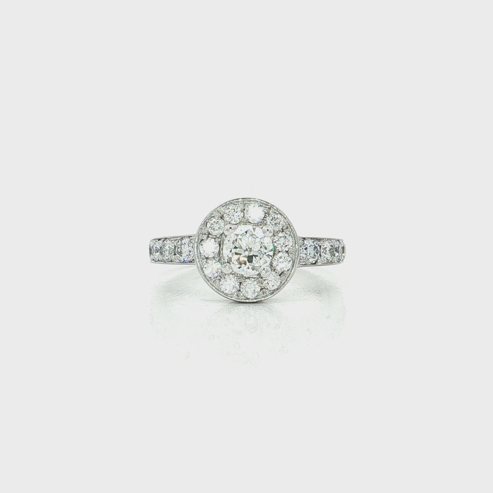 Halo Colorless Diamond Ring (1 ⅛ ct.) in 18k White Gold